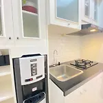 Well Furnished Studio Room At Grand Asia Afrika Apartment By Travelio